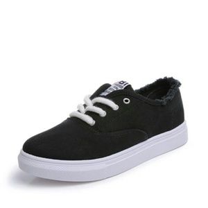 Black and white lace up raw trim slip on sneakers